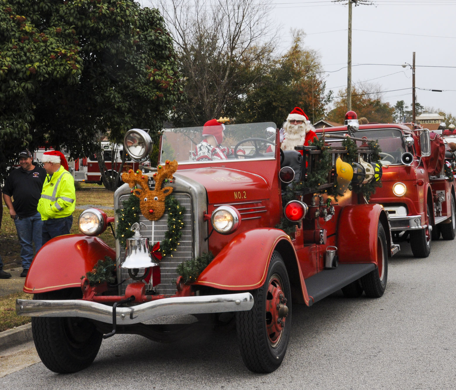 MFD Trucks with Santa.jpg